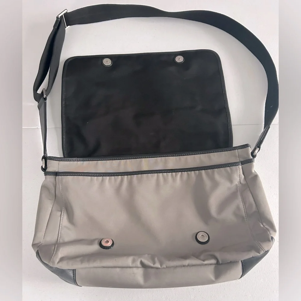 Unisex Coach crossbody messenger bag.